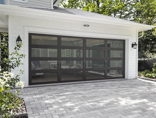 Cuyahoga Falls Garage Door Repair design specialist presenting custom garage door options to Cuyahoga Falls homeowner