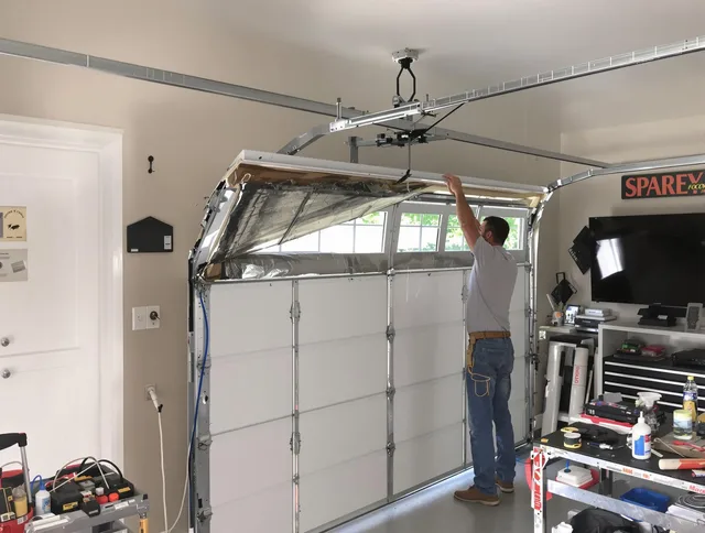 Garage door section replacement by Cuyahoga Falls Garage Door Repair in Cuyahoga Falls